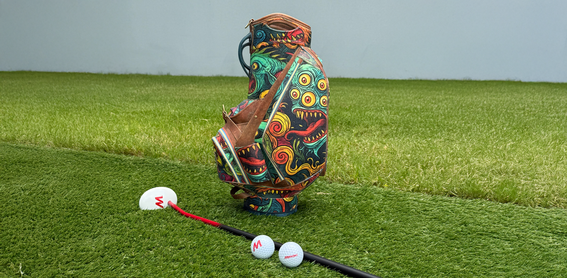 Mimaki 3D printed full-scale golf bag replica featuring a bold monster illustration, part of the Cleeks Golf Club Art of Golf collection for the 2026 LIV Golf tournament.